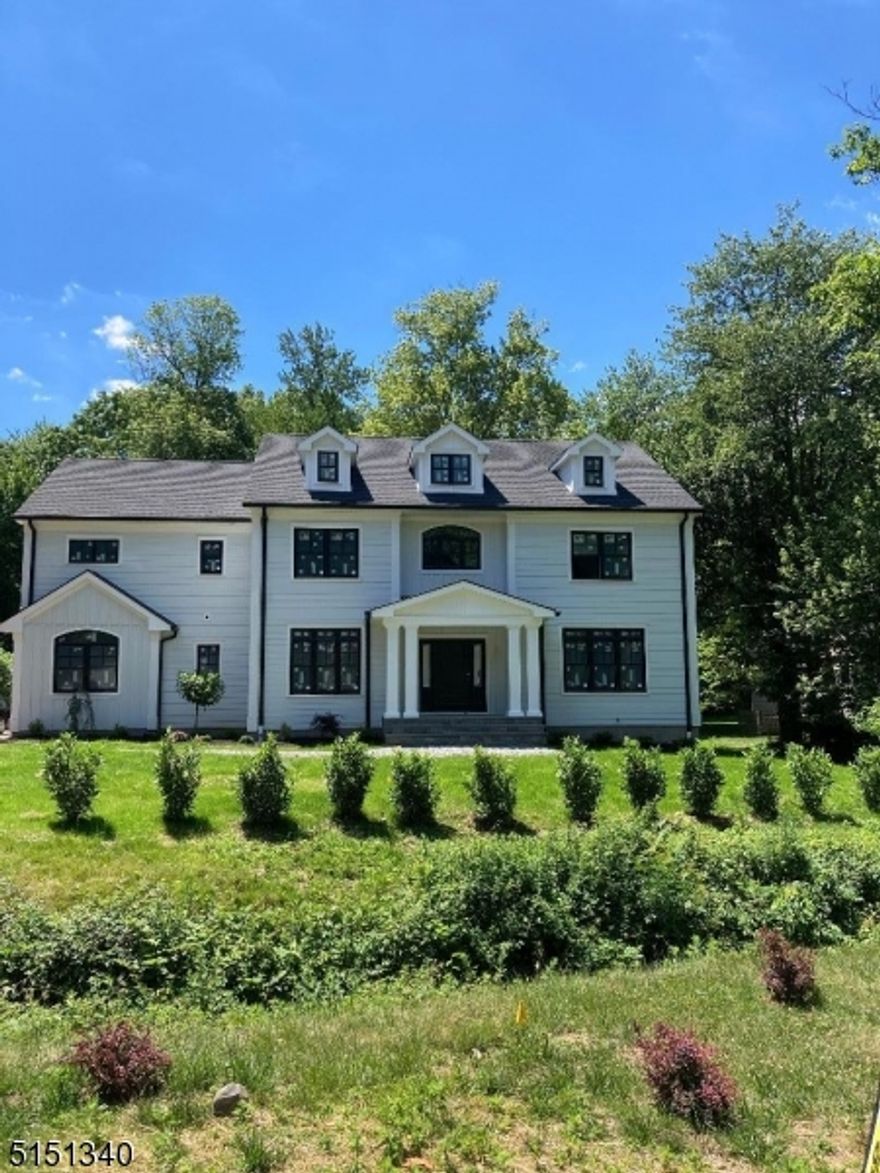 NEW CONSTRUCTION -- NEARING COMPLETION!  6200 sq. ft., 6 Bedroom, 5.1 Bath home including a 1st floor bedroom. Great flow, large rooms, high ceilings on all 3 floors and a full finished basement. Impressive kitchen includes an oversized island, wet bar, professional grade appliances, a walk-in pantry and a butler's pantry.  Beautiful 6 panel full casement bow window overlooks the backyard. Expansive master suite features a 2 story bathroom ceiling and an immense walk-in closet.  Landscape package includes a bluestone front walkway, 350+ sq. foot rear patio, planting beds, an irrigation system and a partially wooded backyard.  Additional features include James Hardie siding with board and batten accents, Anderson 400 series special order windows, high efficiency Rheem hvac units, central vacuum and wiring for an optional alarm system.  Located on a quiet dead end street within walking distance to Summit High School.  10-year builder new home warranty.  June 2022 update: Finish carpentry and tile installation being done inside, walkway and patio being installed outside. Still time to choose some interior options and additional landscaping!