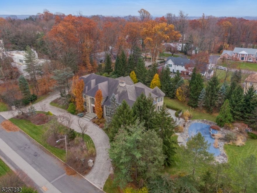 Welcome Home! This stunning custom home is where your search ends! Features over 9400 sq ft of Luxury Living on 2.84 acres. This home features Amenities unsurpassed such as beautiful master bedroom suite with its own vaulted custom sitting room and double WIC and stunning master bath with a centerpiece soaking tub, a library, movie theater, weight room. A grand dining room. Spectacular grand living room overlooking the pristine landscape and In Ground Pool and outdoor kitchen. A State of the Art custom eat in kitchen with all Viking appliances and butlers pantry. This is truly a dream!