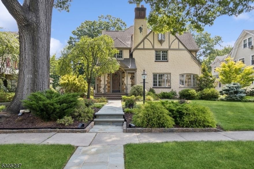 Magnificent custom home masterfully blends 1920s charm with modern luxury finishes. This one-of-a-kind home embodies both comfort and elegance, with exquisite living and entertaining spaces, 5  BRs, 3 full and two half bathrooms, an indoor heated pool, a sports court, with an expansive back yard.The open floor plan boasts elegant architectural details, hardwood floors, and windows galore throughout the home. The stately entry opens to a large living room w/a wood-burning fireplace. The formal dining room has plenty of space for hosting a crowd. The kitchen will bring out your inner chef with its granite counters, custom cabinetry, high-end appliances, and oversized island. The breakfast nook overlooks the patio, the ideal setting for cookouts and cocktail parties. Off the kitchen is a powder room, a family room, and a fabulous indoor swimming pool opening to the patio and yard. The deep back yard is framed by mature tress that afford the utmost privacy.Upstairs, the primary BR is a peaceful retreat with a gas fireplace, two WICs, and en suite bathroom with a steam shower. This level includes 3 additional BRs, a full hall BR, laundry, a 2nd family room, and a sports court. The 3rd floor contains a bedroom, a full bath, and generous storage.The finished basement offers a recreation room with a built-in office area, a half bathroom, and more storage. This spectacular home is close to schools, parks, downtown shopping and dining, and only five minutes to the train station.