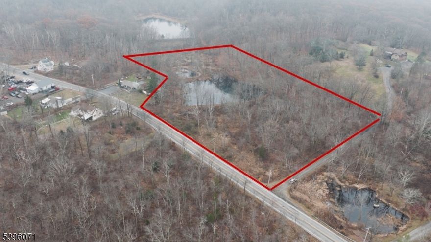 5.74 acres of undeveloped Land in upscale residential neighborhood on Green pond Road. There is a pond on the property and not subject to subdivision as the property is in the NJ Highland Area. Aerial photograph property boundries are approximate based on town files. Buyer responsible for their own due dilligence. Video in links.