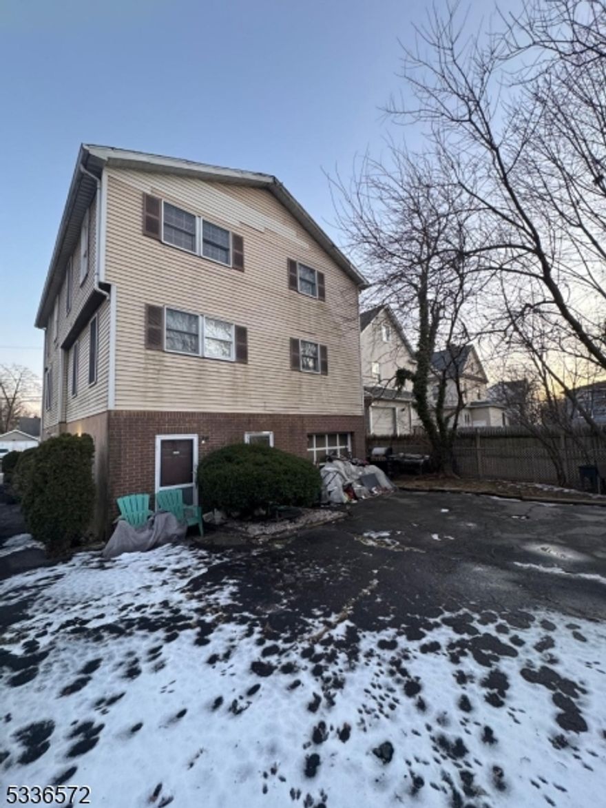 This is NOT a multifamily home; this is an attached single family located in the back of the lot. Short Sale subject to Third Party approval. Property is being sold as is condition. Buyer will be responsible for all repairs.