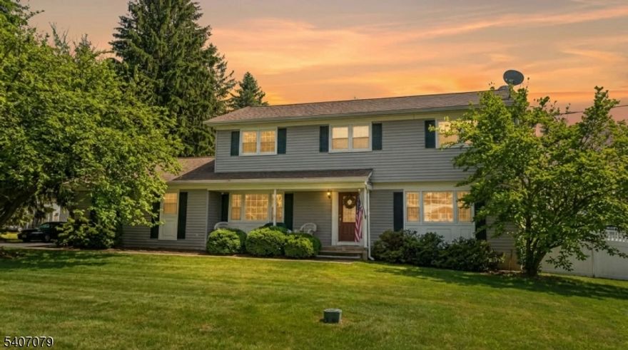 Pride of ownership shines throughout this well-maintained 4-bedroom, 2.5-bath Colonial set on a private 1.35 acre lot. The updated, spacious kitchen features stainless steel appliances, generous cabinetry, and a cozy breakfast nook with window seat. The inviting first floor includes formal living and dining rooms, along with a sun-filled family room featuring a fireplace with wood-burning insert. Sliding doors open to the sunroom overlooking a resort-like backyard with heated gunite pool, expansive patio, and lush landscaping ideal for entertaining or everyday enjoyment. The second floor offers a spacious primary suite and three additional bedrooms, while the partially finished basement can be used as an office, playroom or flex space
