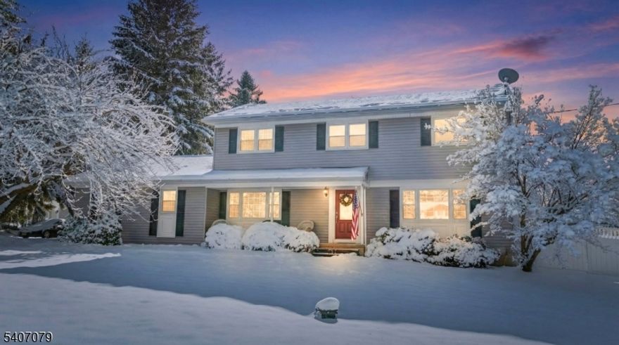 Pride of ownership shines throughout this well-maintained 4-bedroom, 2.5-bath Colonial set on a private 1.35 acre lot. The updated, spacious kitchen features stainless steel appliances, generous cabinetry, and a cozy breakfast nook with window seat. The inviting first floor includes formal living and dining rooms, along with a sun-filled family room featuring a fireplace with wood-burning insert. Sliding doors open to the sunroom overlooking a resort-like backyard with heated gunite pool, expansive patio, and lush landscaping ideal for entertaining or everyday enjoyment. The second floor offers a spacious primary suite and three additional bedrooms, while the partially finished basement can be used as an office, playroom or flex space