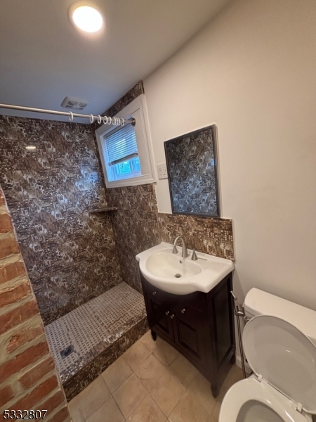 Welcome to Apartment 1B on 312 Paxton St in the Heart of South Paterson! This beautifully renovated apartment offers 3 Bedrooms, 1 Bathroom, a Kitchen, and a Living Room. Each space has been carefully updated to provide both style and comfort. The Kitchen features modern appliances and storage, making it perfect for everyday cooking. The Living Room is spacious and bright, offering plenty of natural light to create a welcoming atmosphere.The 3 Bedrooms are generously sized, providing flexibility for sleeping, work, or extra storage. The Bathroom has been updated with sleek fixtures for a clean, modern design. This apartment is move-in ready and designed with your convenience in mind.Located in a prime area of South Paterson, it's close to shops, dining, a park, and public transportation, offering a perfect balance of accessibility and neighborhood charm. Don't miss the chance to make this lovely apartment your new home!