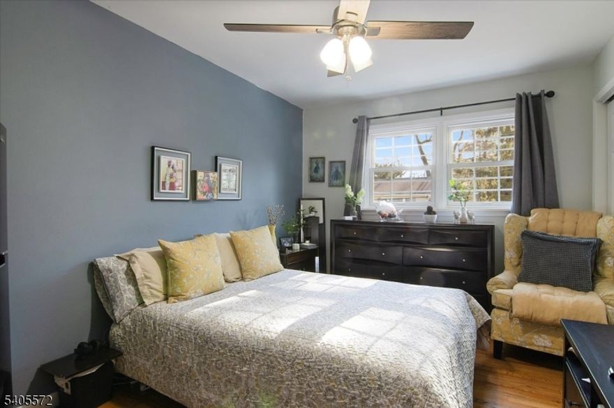 Beautifully updated Colonial offering 5 bedrooms and gleaming hardwood floors. Features include public water and sewer, a dedicated work studio, and a versatile bonus room perfect for today's flexible lifestyle.  Enjoy outdoor living on the large rear deck overlooking a level, fenced yard ideal for entertaining or relaxing. Paver walkway. Prime location close to amenities, schools, and commuting routes.