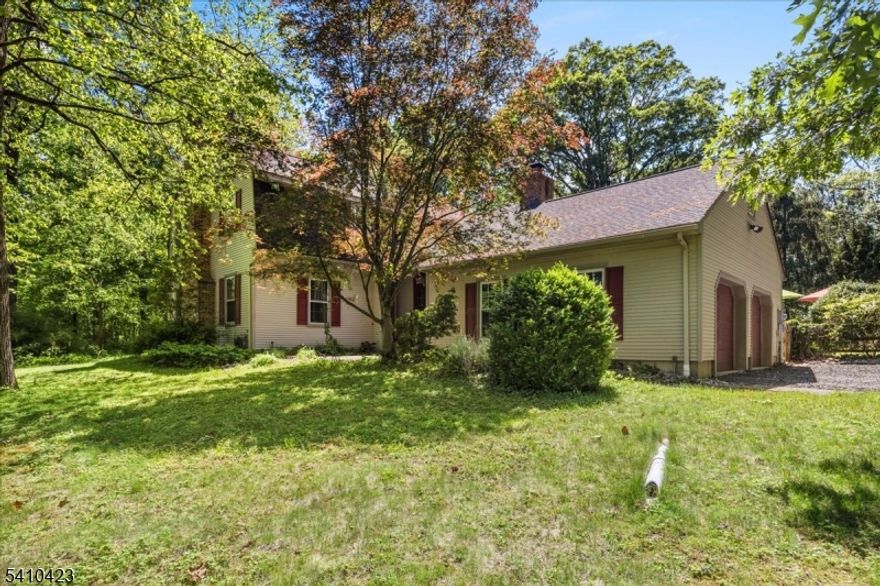 What an amazing location and pretty home! This fine Colonial in desirable Hunterdon County i set on 3 lush private acres. Recent updates include newer roof (approx. 8 years old), New furnace in 2024, PLUS a Brand new Septic System being installed! Beautiful in-ground pool, and backyard area; your own private resort. Oak hardwood floors throughout most of first level. Huge living room with wood floors and fireplace. Wonderful kitchen with tons of cabinetry, furniture grade custom Oak cabinetry, granite counter tops, glass accent cabinets, entire hutch wall/coffee bar area, pantry, island, new laminate floor and opens into the vaulted Sunroom with skylights and year round views. A spacious formal Dining Room w/pocket door, leads into the kitchen. Cozy family room with a second masonry brick fireplace. First floor laundry/mudroom. . The upper level offers 4 large Bedrooms and Office/guest room. Very large Primary BR with walk-in closet and private bath. Minutes to route 78 and downtown Clinton. PLEASE DO NOT DRIVE DOWN LANE WITHOUT REALTOR APPOINTMENT. Pool has regular manual cover, which is included. The electronic cover needs new fabric, seller would fix or credit with full price or over offers. PLEASE DO NOT DRIVE DOWN LANE WITHOUT REALTOR APPOINTMEnt