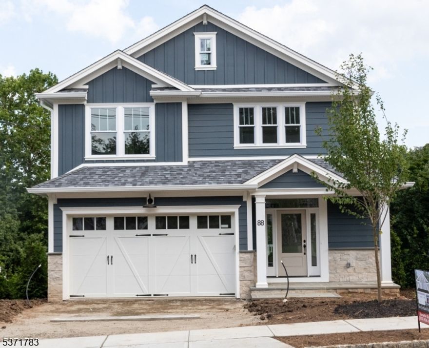Welcome to 88 Ashwood Ave. A 100% newly constructed Colonial with a rocking chair front porch and 2-car attached garage with EV charging port. The day-light basement has 12' high ceilings & designed with full size windows & patio doors. The interior design is exciting and features a modern kitchen with Thermador professional series appliances, quartz tops, a wine bar and a full pantry closet. High ceilings and tall windows bring in abundant natural light. Wide plank white oak floors. Large second floor laundry room. Multi-zone HVAC. Security system. Full attic storage with plywood floors. Multi-zone lawn irrigation system and much more. Please note: 88 Ashwood is NOT a renovation. Instead, it conveys all the benefits of a newly built home with the assurance of a new home warranty plan. Developed by award-winning Menza & Beissel, with a 34 year track record.