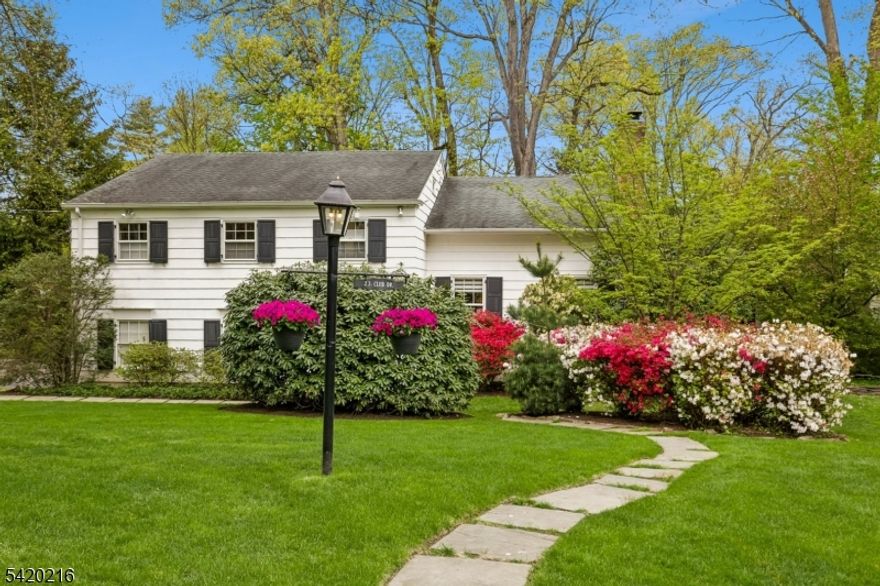 Fantastic 4 bedroom, 3.1 bathroom Split level home resting on a large lot on a beautiful, quiet and welcoming neighborhood in Summit. Upon entering the foyer, the tone is set for your enjoyment as you ascend to the large living room w/ wood burning fireplace and high ceilings while offering an open and warm feeling. The stunning chefs kitchen offers a large center island, perfect for gathering and meal prep, generous cabinet and counter top space as well as a terrific open flow into the dining area with built-ins and an inviting screened-in porch. Just a few steps off the expansive kitchen is the ground level family room with a private rear entrance and powder room, making this an ideal guest suite. The lower level can host game nights in the large rec room along with an exercise area and additional hang out space, laundry room and storage. The upper floor offers 3 bedrooms and 2 full bathrooms plus a spacious primary suite on the top floor. Wonderful house, neighborhood and private property make this your perfect home. Whole house generator