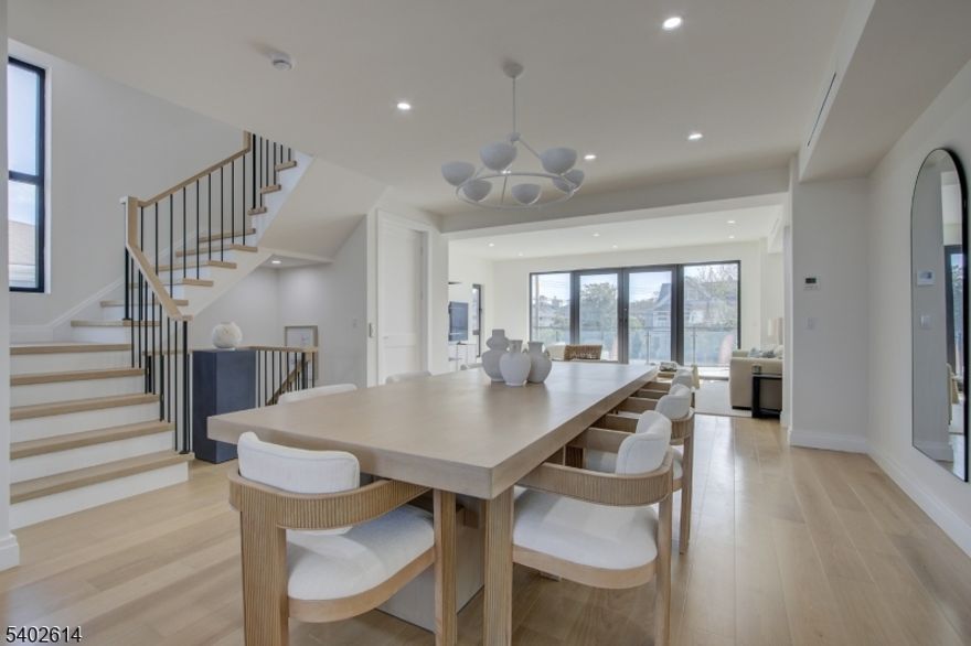 New Construction! Experience Unparalleled Luxury Living at The Seashore in Long Branch! Ride your private in-unit elevator up 4 levels to your expansive rooftop terrace & savor sweeping ocean views. Just minutes from the beach & Pier Village, this limited collection of 14 luxury townhomes offers close to 3,200 sqft of designer interior living space (+1108 SF outdoors) with 3 bedrooms + den, 3.5 baths, multiple balconies & a heated, EV charger ready garage. A modern masterpiece, each home features custom European windows and doors, open-concept living, and a chef's kitchen with premium smart appliances: Nostalgie by ILVE stove & SAVALO refrigerator and dishwasher. After a day at the beach, relax in the exclusive heated resort-style pool or explore the vibrant dining, shopping, and nightlife of Pier Village, Red Bank, Asbury Park, and Sea Bright, with NYC just a ferry ride away. Located minutes from the future home of Netflix, this is coastal luxury at its finest!