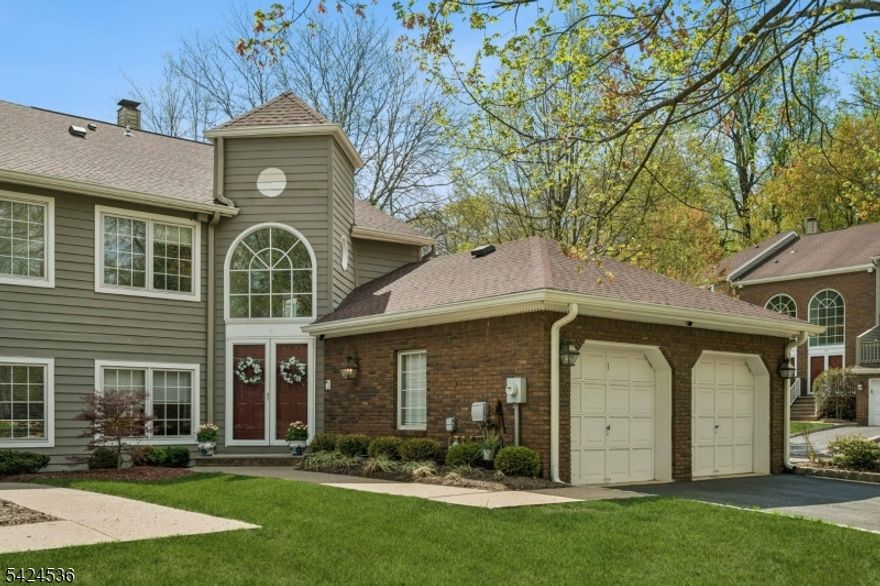 Exquisitely updated, this oversized townhouse is a standout! Tucked on a quiet circle in one of Caldwell's most peaceful communities, this beautiful townhouse offers the perfect blend of comfort, space, and convenience. Once inside, it feels like a single-family home with beautiful finishes, such as raised-panel wainscoting, and ample space. The main level is designed for easy living and entertaining, featuring an eat-in kitchen, dining area, and a bright living room with a cozy gas fireplace. Hardwood floors and recessed lighting throughout. Step outside to the deck - perfect for morning coffee or evening relaxation. Upstairs are two en-suite bedrooms, offering privacy and flexibility. The generous primary bedroom, with a large bathroom, has two custom closets and an additional deck. The fully finished lower level adds valuable living space, ideal for a home office, gym, or media room, along with a full bathroom and separate laundry room. This property has a large 2-car garage and ample storage. Enjoy low-maintenance living in a serene setting just moments from Caldwell's vibrant downtown, shops, dining, and commuter routes.