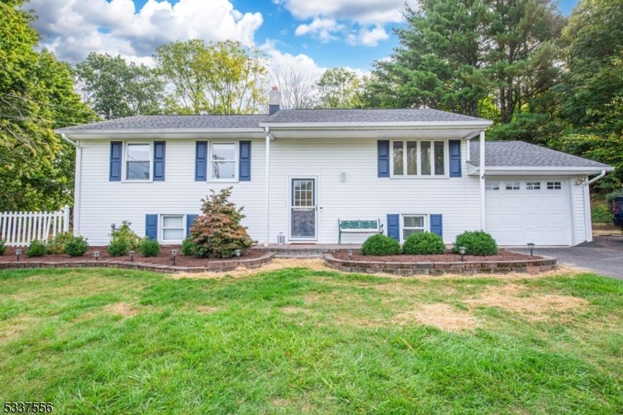 Welcome to this charming 3-bedroom, 1.5-bath home located in a desirable neighborhood. This home features natural light, an open, updated kitchen with granite countertops, stainless steel appliances, and sliders leading to a newly resurfaced deck ideal for entertaining or relaxing outdoors. The main floor is also complete with hardwood floors and brand new carpet in the bedrooms. The lower level is wide open, offering endless possibilities for a cozy den, home gym, or additional living space. Perfectly situated in the valley, this home offers the convenience of public utilities, central air, and natural gas hook up. Don't miss the opportunity to own this move-in-ready home in a sought-after location with traditionally high ranking school systems!