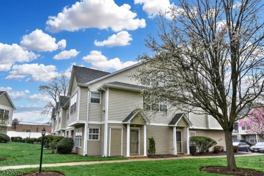 Desirable ranch style condo in Allwood Mews in Clifton NJ offers easy and effortless one floor living less than 20 miles to NY City. This Devon Model end unit features spacious open floor plan with engineered flooring & loads of closet space. Oversized windows flood condo with natural light. Kitchen includes a wide breakfast bar open to the living & dining rooms-ideal for everyday living. Flex. space off living room is perfect for den or home office. Sliders open to wide patio and greenspace for a peaceful setting. Huge primary has windows, walk in closet, its own entry to back patio, full bath with zero clearance walk in shower. Additional bedroom, full bath and laundry are off the hallway. Bonus of one car garage with storage & shelving has direct access to the kitchen.  Add peace of mind with updated mechanicals-furnace, central air & hot water heater for move in ready.  set inside a quiet well maintained condo community yet minutes from shops, dining and DIRECT transportation to NY City, this home offers the perfect balance of suburban living and commuter convenience. True move in ready.  Property conveys with one year home warranty at closing for even more peace of mind.  This is the one buyers wait for--rare end unit ranch style living with space, privacy, natural light and location--all in one!