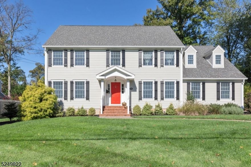 Beautiful colonial home in the Stonehenge section of Westfield. Featuring hard wood floors, eat-in kitchen with large center island, stainless steel appliances, custom cabinetry, granite & quartz countertops with walk-in pantry, mud room, spacious family room with fireplace. Master bedroom suite is complete with walk-in closet, 3 other closets, master bath with shower and free-standing tub, double vanities and attached office. Ample space for entertainment indoors and outdoors with finished basement that includes a theatre, outdoor space with large stone paver patio. Lovely neighborhood conveniently located close to schools and Tamaques Park. Fully renovated and expanded in 2019 by Anthony James Master Builders.