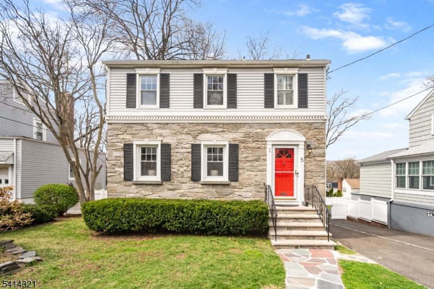 Charming & bright Colonial in a prime Maplewood location! Ideally situated just 1.1 miles from vibrant downtown Maplewood, you'll enjoy easy access to shopping, dining, and the Mid-Town Direct train to NYC. Just perfect for commuters. This inviting home features 3 spacious bedrooms and 2.5 bathrooms, with generously sized rooms throughout. The refreshed kitchen is outfitted with stainless steel appliances and flows nicely into the home's living spaces. A stunning sunroom with vaulted ceilings offers the perfect spot to relax and leads directly to a fabulous two-tiered deck and patio ideal for entertaining overlooking a large, private backyard. Upstairs, you'll find three well-proportioned bedrooms and a beautifully updated main bath, featuring a luxurious soaking tub, creating a spa-like retreat. The finished basement provides excellent additional living space, complete with a full bathroom and a separate laundry area. An attached garage, currently used as a home gym, offers flexibility and can easily be converted back for parking. With ample outdoor space and a highly convenient location, this home truly checks all the boxes. This is a wonderful opportunity to get into sought-after Maplewood.
