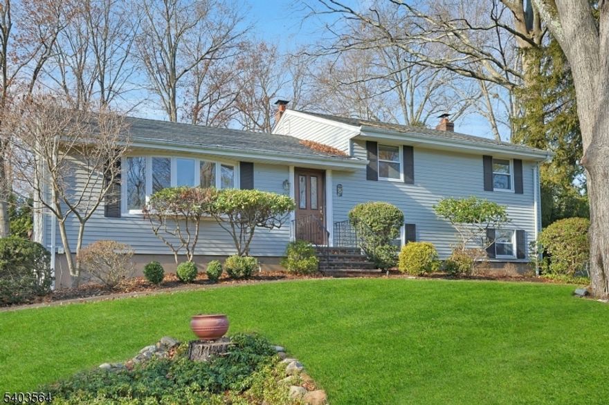 WELCOME! Be impressed by this beautifully maintained, updated and expanded Split Level HOME located in one of Northern River Vale's most desirable neighborhoods. Undeniable curb appeal draws you into this 4 bedroom, 2.5 bath home that is the one you have been waiting for! Its main level features a front entry flowing effortlessly into the large & bright Formal Living Rm, Dining Rm and a beautifully designed Ken Bauer Kitchen with custom cabinetry & designer finishes. Embrace the outdoors in the stunning, expanded 4 Season Room in rear w/impressive walls of glass for views of lush backyard privacy. Perfect for everyday living & entertaining. Upstairs you will LOVE the Grand Primary Suite featuring a sitting area, generous walk in closet & large Primary Updated Bath. Two additional Bedrooms are served by a well-appointed full bath in the hallway. The expanded lower level provides incredible additional square footage with a tremendous and chic recreation room with fireplace, rear yard walkout, a private 4th Bedroom, Half Bath, & Laundry Room.. The long private driveway leads to a large 2 car garage. Located near top-rated school, transportation, parks and shopping. This HOME truly has it all!