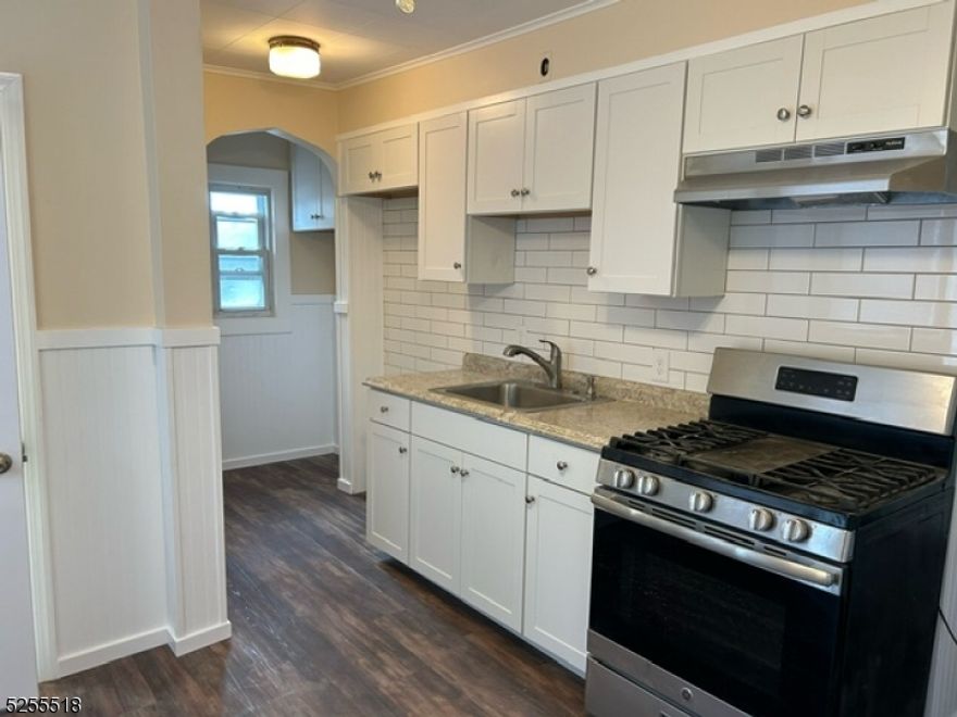 Bright and airy 1 st floor apt in rear of the building. Freshly Painted and renovated. Living room eat in kitchen, 2 bedrooms Basement for storage only. NTN report required for all applicants.