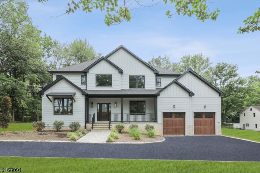 Welcome to your 2022 brand new Construction, luxuriously finished & custom designed home! Upon entering, you are greeted w. gleaming hardwood floors, abundant natural light & a 2 story grand foyer. The formal living area can double as an office or playroom.  Continuing through the center hall, the expansive Chef's kitchen is equipped w. all top of the line GE cafe stainless steel appliances & an enormous 8 foot center island w. breakfast bar. Double custom kitchen desks make a great homework area. The double butlers pantry is perfect for entertaining, connecting the large formal dining room and kitchen. Plenty of room for all your guests to cozy up in the family room with gas fireplace overlooking the peaceful and serene outdoors through sliding glass doors. Generational guests will appreciate the first floor en-suite w. a private bathroom! The fully finished basement is the perfect hangout, w. 8ft ceilings & a full bath. Upstairs you will find 4 oversized bedrooms w. custom shelving, a beautiful expansive laundry room with folding counter, custom cabinetry, laundry sink and designer backsplash. The master suite has double walk in closets, a luxurious spa bathroom, & vaulted 9 foot ceilings. HUGE 1 acre lot w. enormous back yard, plenty of space! Close to major highways, NYC bus line, & the notable Watchung Hills School System. Approximately 4633 sq. ft. finished living space w. basement! Overlooking a beautiful wooded lot, is MOVE IN READY!