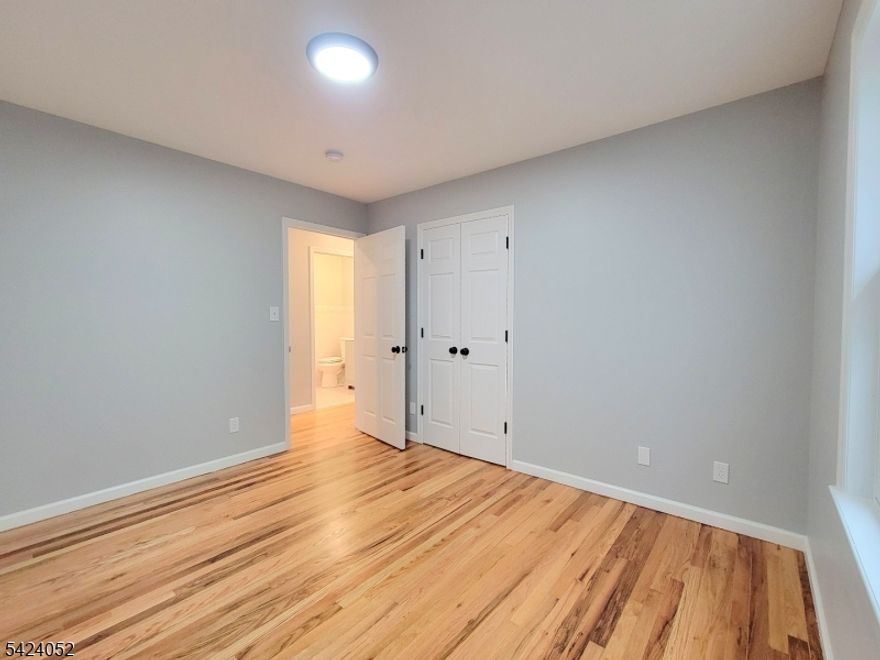 Newly renovated 1st floor 3 BRs 2 Full Baths apartment for rent. All hardwood floors throughout the unit. Newer washer/dryer, cooking stove/oven, dishwasher, kitchen exhaust fan, refrigerator all provided. MBR has full bath and double closets. Minutes away from Journal Square PATH station, restaurants, shopping area. Public transportation is just a few blocks away. Short drive to NYC. Street parking only. Tenants pay electricity, gas, heat, Central AC, hot water.