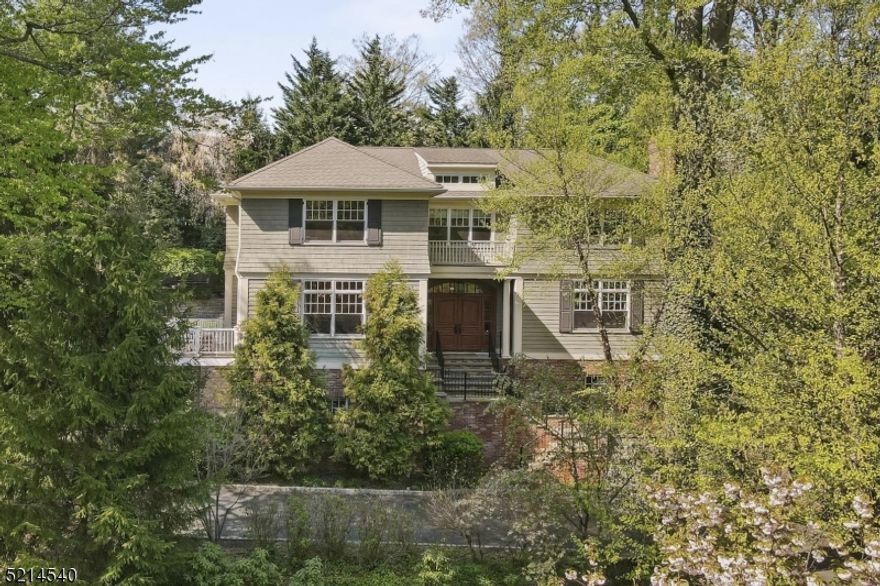 MAGNIFICENT COLONIAL * AMAZING NORTHSIDE LOCATION! * A wonderful opportunity to own your dream home on one of the best streets in Summit. Built in 2006 complete with elevator, this home has cosmopolitan appeal & an easy-flowing floor plan. Enter the inviting foyer to find the elegant living room w/ fireplace, formal dining room & adj deck w/ tree-top views of the property, 1st flr wood-paneled office & open-concept family rm that flows effortlessly into the gourmet kitchen & powder rm. The state-of-the-art kitchen has top ss appliances (Viking, SubZero, Bosch), large walk-in pantry & center island w/ marble counters and breakfast area with banquet seating -- absolutely perfect for todays living! Upstairs, 4 bedrooms include the primary bedroom suite -- a luxurious sunlit room with sitting room, gas fireplace, custom walk-in closet & gorgeous bath with tub, double vanity and glass shower. The LL offers a rec rm or 5th BR w/ bath, entertainment center, lrg laundry rm w/ shower, mudroom space, elevator entrance and oversized 2-car garage. Step outside through French doors to the bluestone patio, professionally landscaped property and level lawn for easy indoor-outdoor entertaining. MORE: Sonos system w/ multiple new speakers, underground sprinklers, CAC, driveway w/ extra parking. Close to NYC trains, the Reeves-Reed Arboretum, all top-rated Summit schools/Lincoln-Hubbard Elementary & thriving downtown Summit w/ a bevy of hopping restaurants & chic boutiques. THIS WILL NOT LAST!