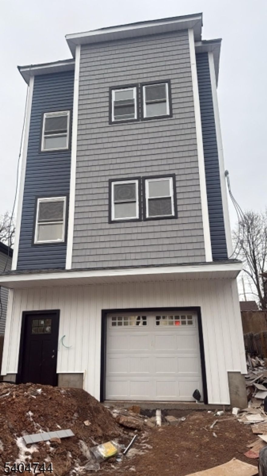 This newly built 3-level property is a rare find, combining modern luxury with strong income potential. Featuring separate utilities throughout, each unit is thoughtfully designed with hardwood floors, washer/dryer hookups, generous closet space, and high ceilings that enhance the open, airy feel.The designer kitchens showcase granite countertops, stainless steel appliances, and cherry cabinetry, reflecting quality craftsmanship in every detail. The property offers a total of 5 luxurious bathrooms, delivering both style and comfort.The first and second floor apartments together offer 5 bedrooms, while the fully finished walk-in ground floor adds flexible living or bonus space ideal for extended living or additional value.Complete with a 10-year home warranty, this is a turnkey new construction opportunity perfect for an owner-occupant or investor seeking long-term value and low maintenance.