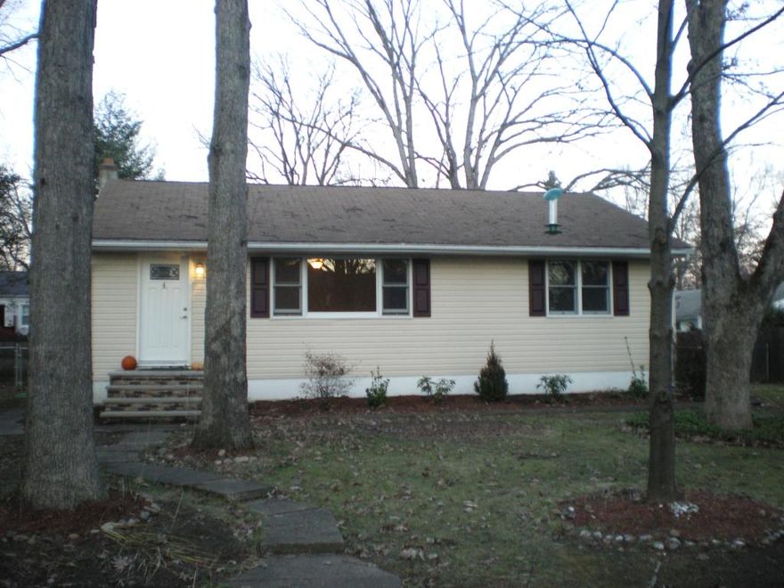 Lovely 5 bedroom Cape Cod home with 3 full baths, newer kitchen with granite counters, ceramic tile floor*Refinished hard wood floors*