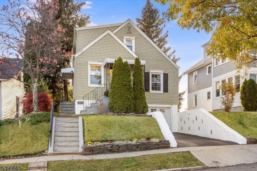 Welcome to your future home at 27 Gillespie Rd, Bloomfield, NJ a charming residence that combines comfort and style. This delightful property features 3 spacious bedrooms, an office that can be utilized as a 4th bedroom, and 1.5 bathrooms, catering to a variety of lifestyles. Step inside to discover a warm and inviting atmosphere. The main level boasts elegant hardwood floors, while the plush new carpet upstairs on the 2nd floor offers a cozy ambiance. Recessed lighting in the living room enhances the modern feel, creating a bright and welcoming environment. Notable updates include new high-efficiency windows on the 2nd floor. Outdoor living is equally impressive with a hot tub in the backyard featuring a newer motor, and a spacious deck surrounded by beautiful landscaping, offering a serene and peaceful retreat. This home provides spectacular views of NYC, where you can enjoy watching the fireworks from the comfort of your backyard deck. The full basement provides endless possibilities for customization whether it's a recreation room, home gym, or additional storage. Chimney, flue and roof sold "as is" with no known issues. Don't miss the opportunity to make this beautiful home in Bloomfield, NJ your own. Schedule your viewing today and envision the next chapter of your life in this exceptional property.