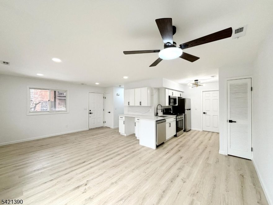 Beautifully detailed and renovated FIRST FLOOR, END UNIT. Featuring 2 Bdrms & 1 Bath, this SINGLE LEVEL UNIT is the epitome of comfort and convenience. All new Stainless Steel Appliances, Washer/Dryer, Lighting, Flooring, Fixtures, and more. The newly renovated kitchen features luxury slim shaker cabinets, quartz countertops and backsplash, and generous storage, plus extra space ideal for a wine fridge or home office nook! Open-floor concept Living & Dining Area with abundant natural light and sliding glass doors that lead to a private deck. Enjoy this 4-Season Community, HOA Pool, Minerals Resort & Spa, Mountain Creek Skiing and Waterpark. Crystal Springs Resort & the popular Warwick Village only minutes away. Bars, restaurants, nightlife, golf, mountain biking, shopping, day spas and many year-round festivals. Only 50 miles to NYC! Perfect for year-round living, investment opportunities, or an ultimate vacation getaway! Must See!!