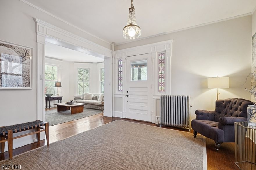 Stunning close to town Victorian with 5 bedrooms and large scale living spaces throughout.  Newly renovated baths, white marble eat in kitchen, high ceilings and abundant architectural charm, this home is move in ready.  Ideal Summit lifestyle within short distance to downtown shops, train, schools and Memorial Park.  Large private welcoming front porch and rear deck off family room opens to fenced yard.  New since 2018: Roof, hot water heater, two new central air conditioning units, upgraded sprinkler system, baths, lower level renovation, front bedroom renovation and interior paint and decor,  Location!