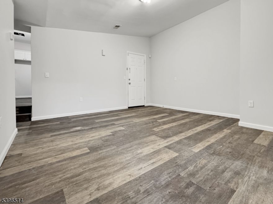 Modern elements are found throughout this incredible second floor apartment that offers great space with amazing finishes. This two bedroomapartment has a beautiful kitchen that offers white shaker cabinetry that is combined with stainless steel appliances and white countertops with coordinatingwhite subway tile backsplash. Stackable laundry is within the apartment! This incredible space offers no carpeting at all with beautiful luxury plank vinyl flooringinstalled throughout. This is a truly unique apartment that has modern feel and amenities, schedule your showing today to see everything this apartment has to offer!