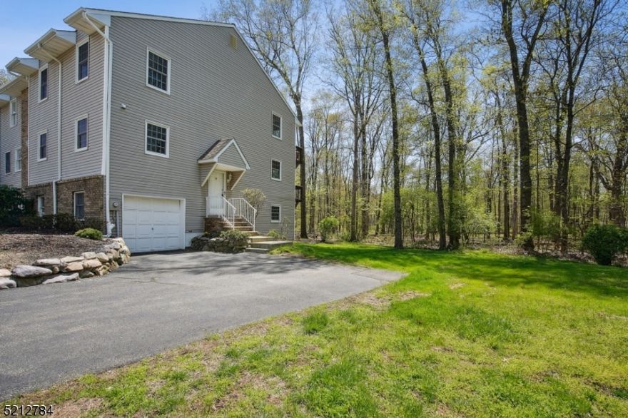 Welcome home to this private end unit in the desirable Brookstone community of Parsippany-Troy Hills. With spacious rooms and plenty of storage throughout, it combines the serenity of a quiet enclave with close proximity to shopping, dining, major roads and a direct train to NYC. Tucked in a quiet corner in the back of the development, this lovingly maintained unit offers plenty of privacy and lots of natural light.  The open-concept living/dining combo on the first floor features an expansive living area with access to a private balcony and a generous formal dining space. Quartz countertops and a walk-in pantry complete a charming eat-in kitchen. Upstairs, two en-suite full baths compliment the bedrooms. A sitting room with access to an upper balcony in one bedroom and a windowed walk-in closet in the other add their own comforts to each room. An additional bedroom on the ground level offers access to a patio and makes for a perfect flex space for whatever you may need, be it another bedroom, office, excercise or recreation room. Comfortable and move-in ready, all you will need to do is unpack!