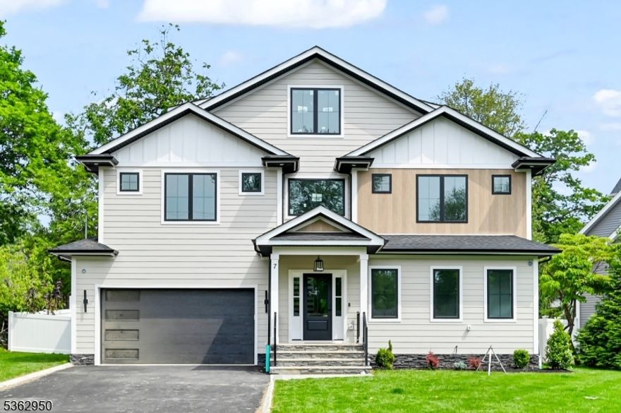 Welcome home to this NEW CONSTRUCTION colonial home, nestled on a 0.22-acre FLAT lot with a white FENCED BACKYARD. This 6-BD, 5-BA residence offers a blend of elegance and modern luxury across 3 beautifully appointed levels. Upon entry, you are greeted by a grand DOUBLE-HEIGHT foyer that sets the tone for the main level. This space features a sophisticated dining room, a guest bedroom, and a stylish full bathroom. The OPEN-CONCEPT design flows effortlessly throughout, showcasing premium finishes and attention to detail. The gourmet EAT-IN KITCHEN is a chef's dream, complete with custom cabinetry, a spacious center island, HIGH-END SS Appliances, quartz countertops, and a walk-in pantry. Seamlessly flowing from the kitchen, the family room features an elegant fireplace and sliding doors that open to a large paver patio and backyard perfect for entertaining. Upstairs, you'll find four generously sized bedrooms, including a luxurious primary suite with a walk-in closet, additional closet, and a spa-inspired bathroom featuring a soaking tub, stall shower, and dual vanities. One bedroom is en-suite, while the other two share a full bathroom. A convenient laundry room completes this level. The fully finished basement adds even more living space, with an additional bedroom, a spacious Recreation Room w/ WET BAR, and a full bathroom. With modern Smart Home features and a 10-year builder's warranty, this home offers both convenience and peace of mind.