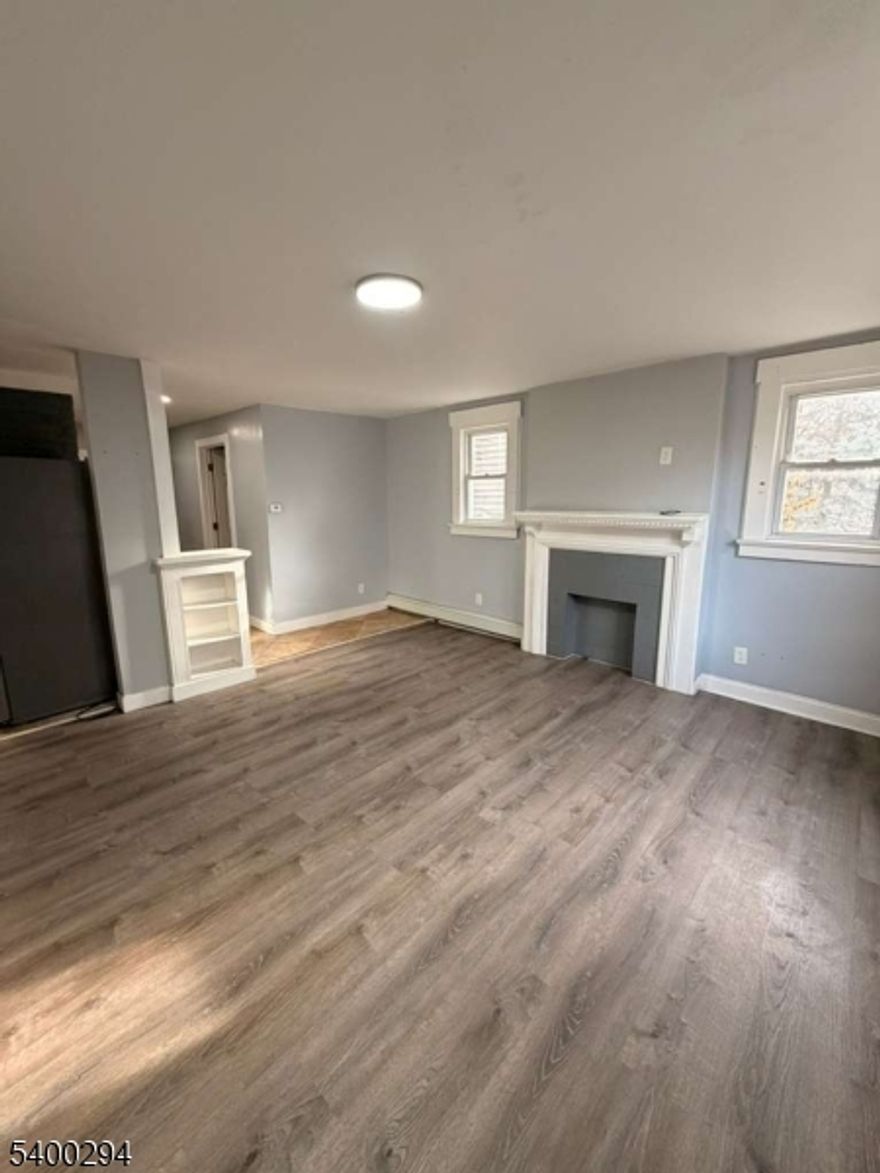 99 Brookdale Ave, located in the Vailsburg section of Newark, offers a freshly updated 2-bedroom, 1-bath apartment featuring a bright separate living room, an upgraded kitchen, and well-sized bedrooms including a walk-in closet for added storage. The bathroom includes tile finishes and standard fixtures. Heat, cold water, and hot water are included for added convenience. Situated near NJ Transit bus lines, local schools, Vailsburg Park, shopping, and major highways, this location provides easy access to South Orange, Downtown Newark, and NYC commuter routes.