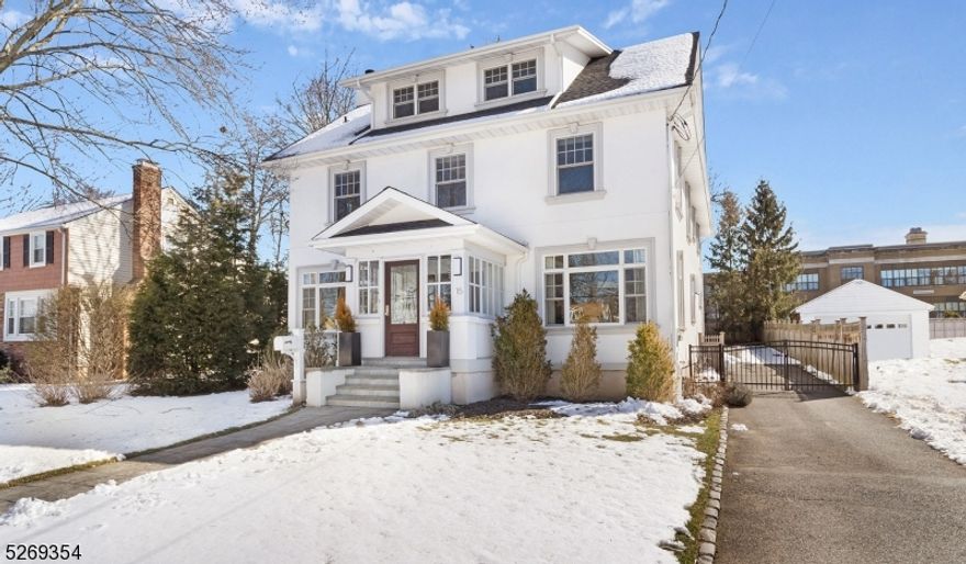 This exquisite colonial home boasts 5 bedrooms and 3.1 bathrooms, including a luxurious primary suite with a large walk-in closet and a spacious primary bath featuring radiant heat, an oversized stall shower and soaking tub. The kitchen features radiant heat for added comfort. The home also includes a cozy family room with a gas fireplace, and convenient mudroom. The lower level of the home offers the ultimate game room space, ideal for entertainment and leisure activities. Additionally, a detached garage provides enhanced privacy and ample space for parking vehicles or storing belongings. The generous size of the garage allows for accommodating larger vehicles and offers extra storage space, with the loft area adding versatility to the structure. Outside, a backyard oasis awaits with a large patio and firepit, creating an excellent outdoor living space for relaxation and gatherings. The firepit adds warmth and ambiance, making it a cozy spot for socializing or enjoying evenings outdoors. Overall, this colonial home combines luxurious amenities with practical features, making it a truly desirable property for comfortable living and entertaining. Close to shopping, train line and historic downtown Madison. This home has so much to offer it's not a drive by!! BARN AS IS... CHIMNEYS as is no known defects