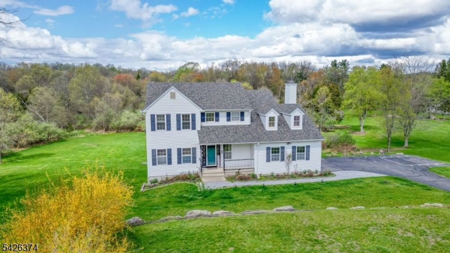 This 4-bedroom, 2.5-bath home is set on 4.67 private acres on a quiet cul-de-sac street, offering space, privacy, and a peaceful setting. Inside, you'll find a warm and inviting layout with spacious living areas and abundant natural light. The kitchen features ample cabinetry and a pantry for added storage, along with a slider leading to a large rear deck perfect for seamless indoor-outdoor living. The family room offers a cozy fireplace, while the living room features a pellet stove, adding warmth and character throughout the home.All four bedrooms are located on the second floor. The primary suite includes a private en-suite bath and large closets, creating a comfortable retreat. Additional highlights include hardwood floors, cathedral ceilings, a formal dining room, geothermal heating, 4 year young roof, and central air conditioning, a 2-car garage, and an unfinished walkout basement!!!!!!!!! Home is very clean, bright and inviting!