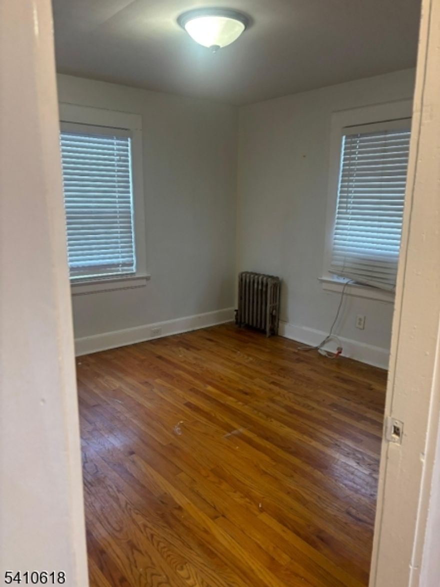 Home in need of repairs and updates, offering a solid opportunity to renovate to your taste without a full gut rehab. Located in a desirable Belleville neighborhood with convenient access to NYC, schools, and houses of worship.