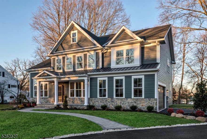 Discover luxury within this new construction, side hall colonial home, nestled on a sought-after street in Florham Park. Boasting over 6,000 square feet of finished space and offering an attached side 2-car garage. The first floor introduces a spacious bedroom with a lavish en-suite, a culinary haven with a stunning 10-foot quartz island, and top-of-the-line appliances in the kitchen. Entertain effortlessly with a large deck extending from the dinette and a family room featuring a fireplace that opens onto a deck. A discreetly tucked-away oversized pantry adds practicality and charm to the first floor. The main level is further enriched by a powder room, a versatile flex room, and a formal dining room off the front foyer. Ascend to the second floor, revealing four well-appointed bedrooms, three full baths, including a primary suite with an enormous walk-in closet with a hidden laundry room access point. A secondary suite and two additional bedrooms connected by a jack-and-jill style bathroom enhance the upper-level living experience. The third floor unveils a flexible sixth bedroom with another en-suite, perfect for alternate living arrangements. Descend to the basement, a sprawling 1800 square feet of finished space with a bonus full bath and wet bar. This meticulously designed home combines elegance with functionality, providing an unparalleled living experience in Florham Park.