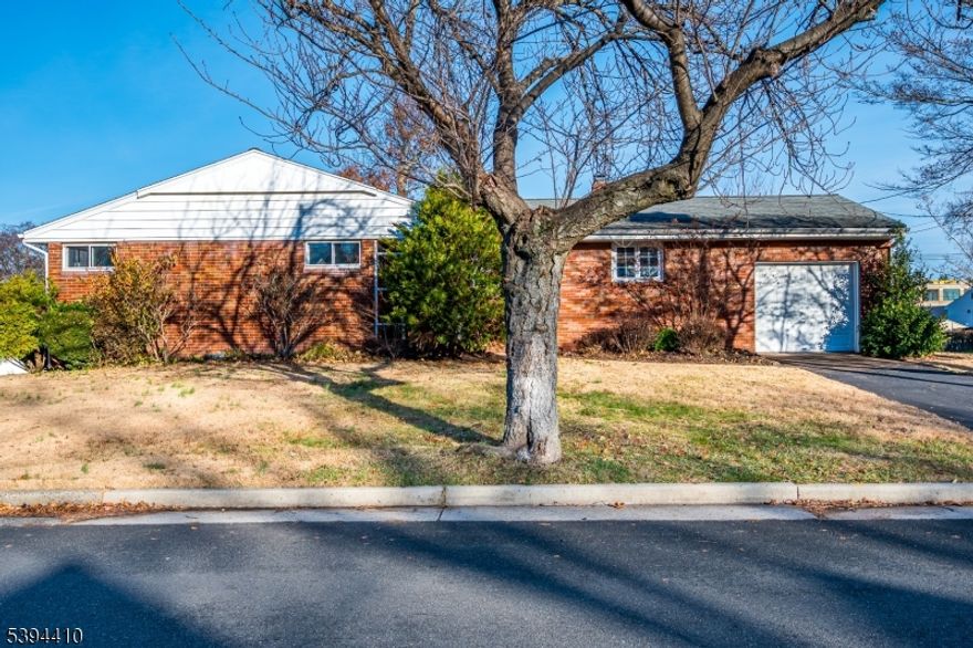 Welcome to this roomy, ground-level ranch in the New Market section of Piscataway! This home features a light-filled living room (hardwood floors under the rug), formal dining area with sliding glass doors, and a well-appointed kitchen with gorgeous granite countertops, new appliances, and tons of storage space. Three spacious bedrooms and a modern bath complete the interior. A large basement with high ceilings provides a great opportunity for those who would like to expand their living space. Gardeners will appreciate the huge yard on a corner lot with lots of sunshine. The location is fantastic - just blocks away from shopping, restaurants, and New Market Park. Easy access to both highways and public transportation. Move right in! Showing starts on December 6th.