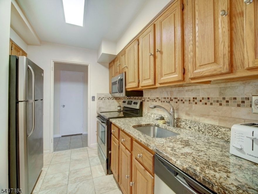 This large Northeast corner 9th floor COOP offers views and a terrace along with 3 bedrooms, 2 baths and original parquet hardwood floors. Here's another opportunity to join the popular Harrison Park Towers COOP community just in time to enjoy the upcoming spring gardens out back and take be a part of the summer festivities. In addition to a 24 hr front desk, onsite management and complimentary jitney services, there is a healthy fitness center and underground parking. Looking for an easier and low maintenance  way to live? Come home to HPT!  Coop board approval (all adults) required and 20% down payment is a requirement. Owner occupied purchases only. Ownership shares - 440. Monthly maintenance $2004 which includes taxes, maintenance and all utilities (heat/AC, hot water, electric). See details on entrance requirements and move-in fees (low closing costs).