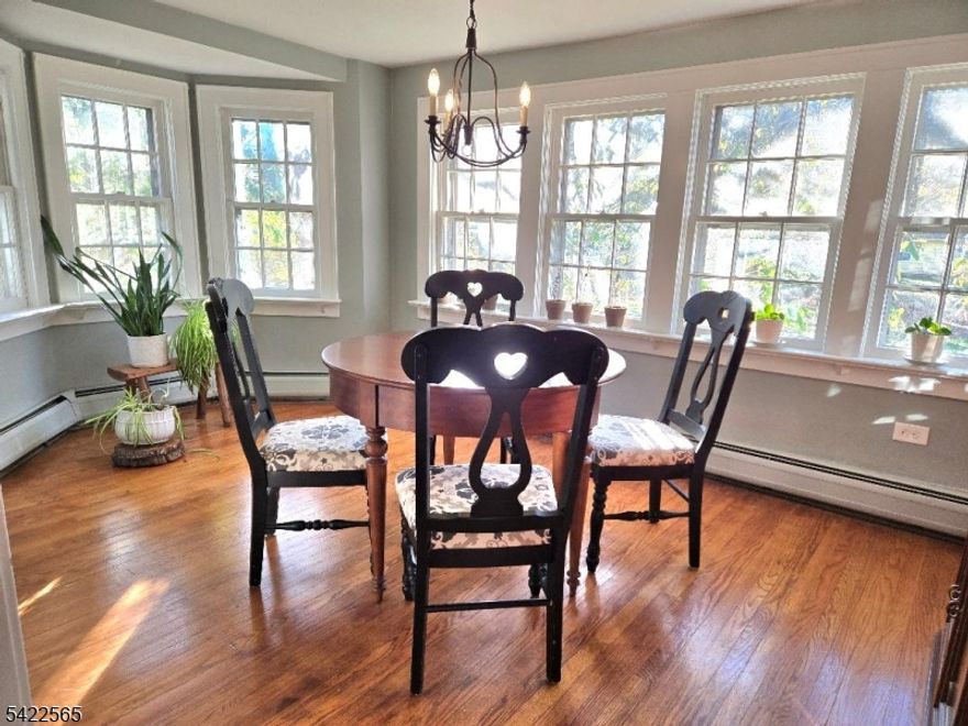 This beautiful corner property home is not a drive by, much larger than it appears, 1 stone fireplace in living room, kitchen, dining room, den with wood burning stove, laundry room with half bath, foyer, sunroom, family room with fireplace and kitchen, bedroom with full bath and walk in closet. 2nd floor primary suite with full bath, linen closet and walk in closet; 2 additional bedrooms and another full bath; large attic with 2 good size windows and electric. full unfinished walk out basement (3 sections) with above ground oil tank can be finished.  20x40 inground pool, large 18x20 shed, 2 decks; home has always been used as one family but is legal two family.  Close one door and there's a 4 room, one bedroom w/full bath for an in law suite on 1st fl with private entrance and deck, if needed.  Close to Mt. Arlington and Dover train stations, close to Rts 23, 15 & 80. Under 1 hour to NY or PA. Close to Golfing, Boating at Lake Hopatcong & Skiing at Vernon Valley. Home is in excellent condition. Yard has many perennials and small bridge to back of property to shed and garden.