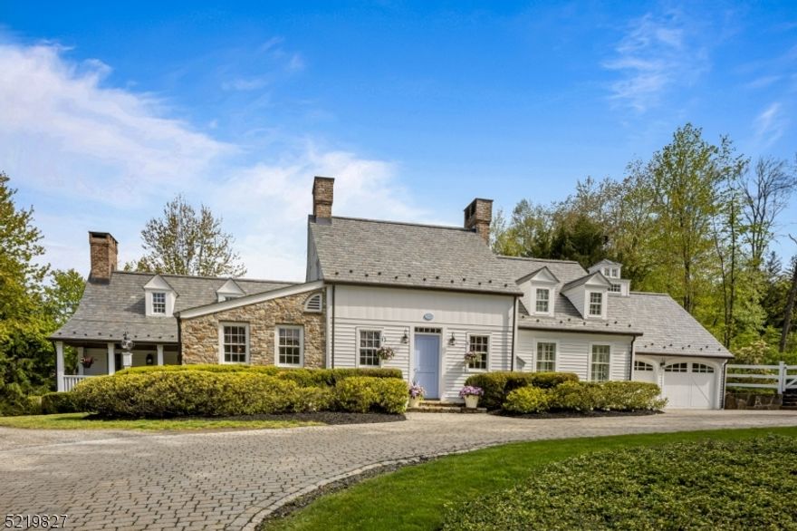 Steeped in history and primitive grace, 40 East Main is the perfect blend of sophistication and understated elegance in the Mendhams. One of the finest and most admired properties in Brookside, this stunning country home is set on almost two acres with incredible privacy and features a stone-walled courtyard, imported Amdega English Conservatory, original beams and wide plank pine floors, primary suite with full dressing room, two walk-in closets and covered porch, gourmet kitchen with custom cabinetry, stunning formal dining room with stone floors, multiple mudrooms, four fireplaces, and a spectacular 3 story finished barn. A truly rare offering.