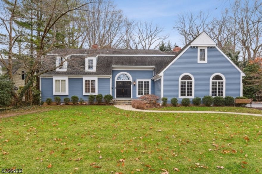 Welcome to your DREAM HOME in the heart of Chatham Borough, offering architectural clean lines with style and sophistication! Nestled on one of the most coveted streets, this custom contemporary home boasts 5 bedrooms, 3 full baths, and 2 half baths on a flat private landscaped lot.Upon entering the double front doors, you will be greeted by the exquisite two story foyer and office providing a tranquil work from home space.The stunning open floor plan seamlessly connects the gorgeous eat-in kitchen to the spacious Great Room. Natural light floods the space through magnificent floor to ceiling windows and sliding doors leading to a picturesque backyard, complete with patio perfect for indoor/outdoor entertaining.This level includes a 2nd FIRST FLOOR PRIMARY SUITE w/ ensuite bath, plantation shutters and large closets as well as the dining room,mudroom,and powder room.The 2nd floor includes the Primary Suite,skylight windows & a lavish bathroom w/ soaking tub. Three additional bedrooms are connected to a loft currently used as an upstairs den along with a full bathroom and convenient laundry room.The lower level offers a large recreation room, gym & family room featuring custom built-ins & powder room. Features include custom molding,2 fireplaces,modern skylight windows bringing an abundance of natural light & oversized 2-car attached garage. Unparalleled elegance and comfort in this remarkable sanctuary, a true masterpiece! Walk to town,trains  blue ribbon schools!