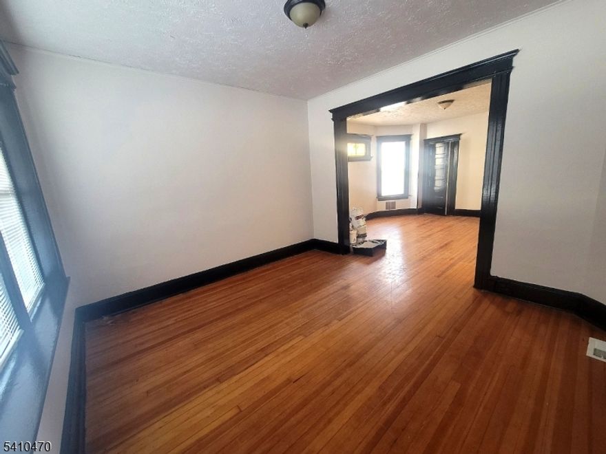 Welcome home to this beautifully maintained 2-bedroom, 1-bath first-floor unit located in the heart of Newark. This bright and spacious apartment offers a comfortable layout with generous living space, perfect for relaxing or entertaining.Enjoy a bright and airy living space, generously sized bedrooms with ample closet space, and a functional kitchen perfect for everyday living. The first-floor location provides added convenience and accessibility, making move-in easy and stress-free.Located near major highways, public transportation, restaurants, and neighborhood essentials, this home places you right where you need to be while still offering a comfortable residential feel.