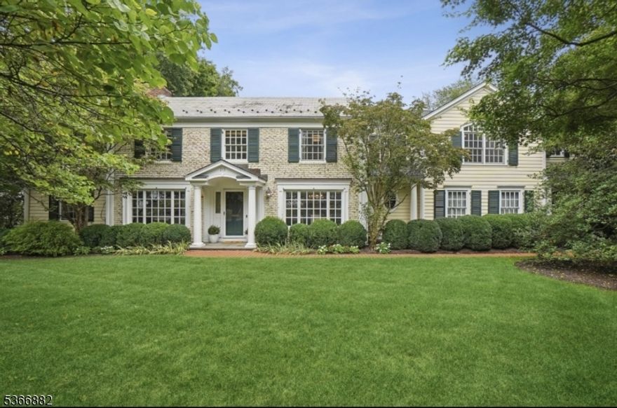 This stunning residence is nestled on .7 acres in the highly sought-after Hill section of Madison. This exceptional home offers six BR, 4 full 2 half baths and a layout designed for both luxurious living and everyday comfort, just moments from NYC trains, and downtown shopping. Located in the Torey J. Sabatini Elementary School district, a nationally recognized Blue Ribbon School, this home is the perfect blend of elegance, functionality, and convenience. The primary suite features soaring ceilings, intricate arch details, a cozy gas FP, and a private sitting area just off the walk-in closet. In addition to the primary suite, the second floor includes an en-suite guest room, four additional bedrooms, two additional full baths, and a charming study nook. Thoughtfully designed for both entertaining and daily living, the 1st floor boasts a large DR with wood FP, home office, playroom, stylish powder room, mudroom, pantry, and a stunning FR with high ceilings, moldings, wood-burning stove and French doors that open directly to a beautiful brick patio. The spectacular kitchen contains white custom cabinetry, a six-burner professional range, dual high-end Wolf stainless ovens, Sub-Zero refrigerator, two Bosch dishwashers, center island for casual meals, and a vaulted-ceiling breakfast alcove with custom bench seating. The lower level features a large game room, designated workout space, mudroom, full bath, laundry area, and ample storage.  Enjoy the lovely yard with brick patio.