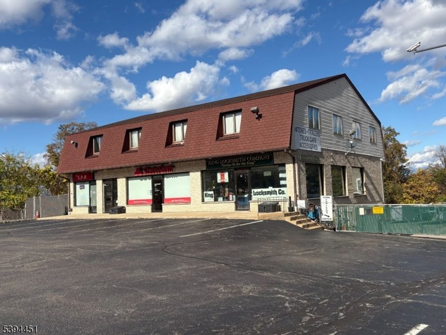 Outstanding high visibility location!!! Over 2 acres of property includes 3 retail storefronts, 5 office units and an industrial-use tenant. Two buildings in total. An additional lot is land-leased to a prominent billboard company for additional income. Do not drive or walk the property without an appointment. Do not disturb the tenants. ALL inquiries must go through a licensed real estate professional.