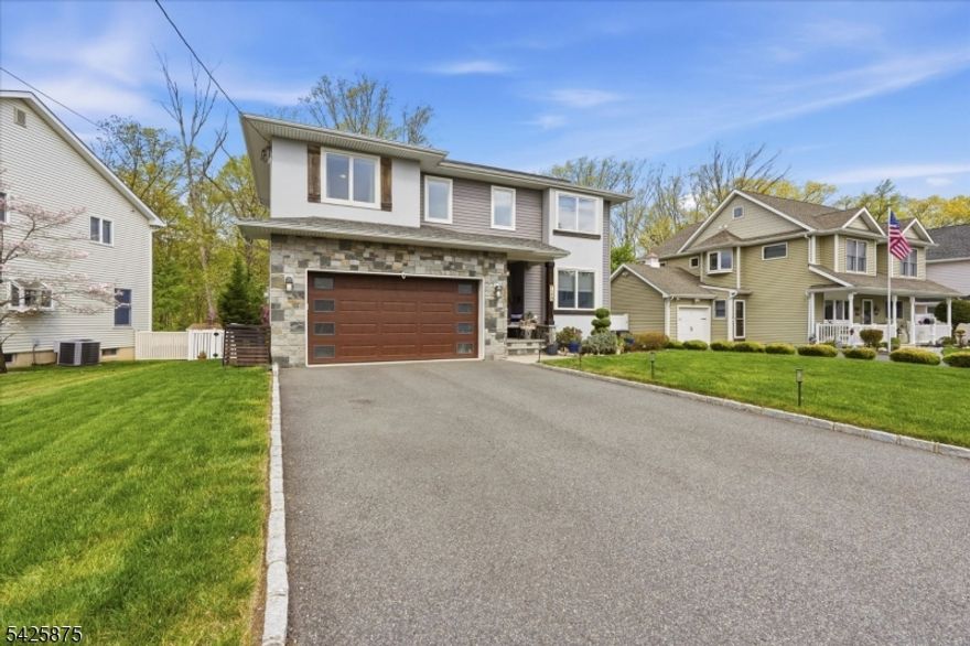 Fall in love with this thoughtfully custom-built 4-bed, 3-bath colonial featuring stunning curb appeal with professional landscaping, and custom stonework. Inside, detailed craftsmanship shines through with engineered wood flooring, custom molding, and wood-beam ceilings.The main level includes a front office/guest room with barn doors, a beautifully tiled full bath, and an elegant open-concept family room, dining room, and kitchen area. The family room offers a gas fireplace and French doors leading to the Trex deck. The eat-in kitchen features two sinks, stainless steel appliances, granite counters, under-cabinet lighting, and a pocket-door entry to a butler's pantry/mudroom with garage access. The dining room features ship lap wall accent. The second floor includes a laundry room, three spacious bedrooms, a full bath with double sinks, and an impressive primary suite. The expansive primary suite features a customized large dressing-room-style closet. The primary bath ensuite features a soaking jetted tub and oversized two-person steam shower that provides a spa like retreat in your own home.This home offers a large basement with high ceilings for storage space or room for future finishing. Backing to a wooded county trail, the property offers privacy and outdoor enjoyment with a raised Trex deck, under-deck storage space and a shed.Put this home on your must-see list you won't be disappointed.Please submit offer by 11am Monday 4-27.
