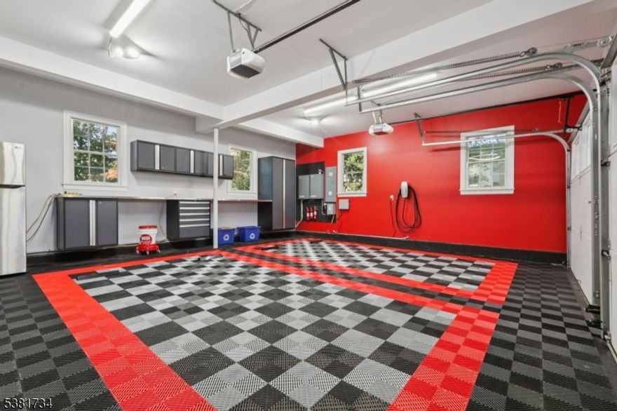 Welcome to this exceptional residence where timeless elegance meets masterful design. Presented for the first time by its original owner, this steel beam"constructed home reflects uncompromising quality & meticulous care.The foyer opens to a private office & gracious living room. A formal dining room, expansive kitchen & inviting family room create an ideal blend of sophistication & comfort, enhanced by soaring 9ft ceilings & hardwood flooring. The gourmet kitchen is the heart of the home, showcasing cherry cabinetry, granite countertops, SS appliances & SubZero/Viking refrigeration & range.The 2nd fl offers a primary suite w/spa-like bath, dual walk-in closets & sitting room. An in-law/guest ensuite, 2 additional bedrooms, a full hall bath & laundry room complete this level.The 3rd fl presents a versatile retreat w/full bath perfect for family/game/media room, gym or guest suite. The basement, w/9ft ceilings, provides abundant storage & endless potential.Outside, a private fenced backyard & patio create a tranquil setting. The garage is a dream for hobbyists & car enthusiasts, complete w/custom workspace & 2 electric car chargers. Recent updates include fresh interior & exterior paint.Perfectly positioned on a prominent street in Morristown's historic district, this residence offers a rare blend of prestige, privacy & proximity less than a mile to the vibrant town center w/shops, dining & entertainment.