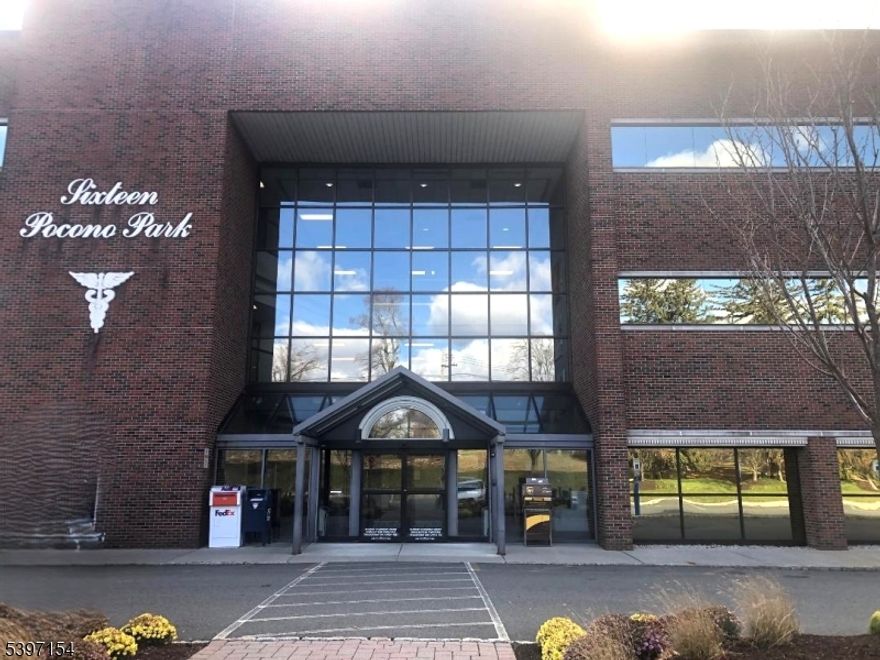 Sought after prime office condo in the heart of Morris County in Pocono Pk across from St Clare's.  Open floor plan with large reception area.  4 exam rooms, large patient waiting room, 3 private office.  Admin area. 2 Sterilizing machines.  Stereo for entire office.  2 smart thermostats.  Ideal end location unit with many windows.  Main atrium offers waiting area with access to elevators.  Heat included in association fees,