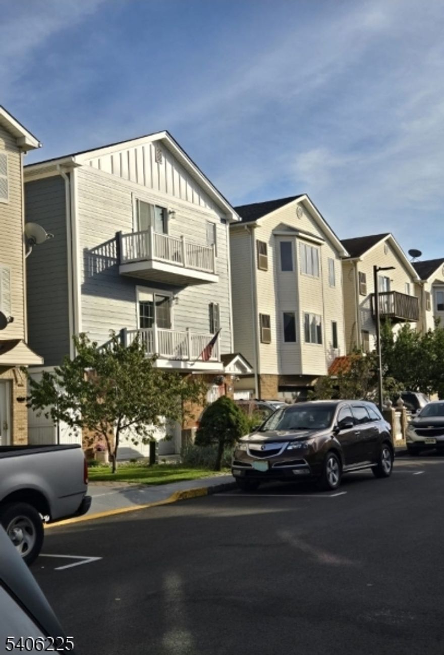 Welcome to this beautiful 3-bedroom apartment that is on the 2nd floor of a young, well-maintained property. Private community in the Ironbound section of Newark. Gorgeous hardwood floors throughout, spacious spaces, separate living and dining rooms, tons of natural light, clean, fresh and inviting, private balcony for some fresh air. It has central air and forced hot air, ensuring year-round comfort no matter the season. It also has a large kitchen with plenty of counter space. The main bedroom has a walk-in closet offering ample space.  Residents have access to a playground, common parking, and are close to everything. Don't miss the opportunity to make this amazing apartment your new home.