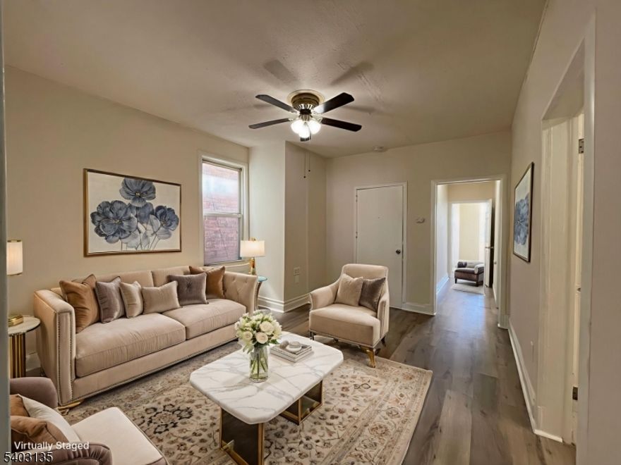 Heat Included! Spacious 3-bedroom, 1-bath apartment for rent in Newark, conveniently located near public transportation, the I-280 highway, schools, places of worship, and close to Branch Brook Park. Freshly painted throughout and features stylish, contemporary finishes. Beautiful crown moldings displayed throughout the primary bedroom. Also includes an additional room that can be utilized as a walk in closet or a home office.