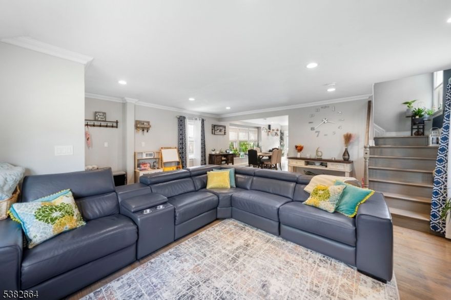 Welcome home to this stunning, expanded Colonial, completely renovated between 2019-2022 and designed for today's lifestyle. Step inside and you'll be greeted by an open concept main floor filled with natural light, highlighted by recessed lighting and a warm, inviting living room with fireplace. The spacious dining area flows seamlessly into the modern kitchen featuring a center island, quartz countertops, and ample cabinetry perfect for both everyday living and entertaining. A sleek full bath completes the main level. Upstairs, you'll find two comfortable bedrooms and a beautifully updated full bath, offering the perfect retreat at the end of the day. The fully finished basement expands your living space with a large family room, an additional versatile room ideal for an office, gym, or guest space, plus a laundry area with direct access to the backyard. Step outside to your own private oasis an entertainer's dream with a gorgeous fenced-in yard, brick BBQ, bar area, and an above-ground pool for summer fun. Additional upgrades add peace of mind, including a furnace (3 years old) , tankless water heater/boiler two zones (5 years old), brand new sewer line 2020. The home also features a two-car driveway, beautiful curb appeal with patio walkway, and thoughtfully designed landscaping that makes a lasting impression. This is a legal 2 bedrooms house, could be turn into a legal 3 bedrooms with necessary permits from the city.